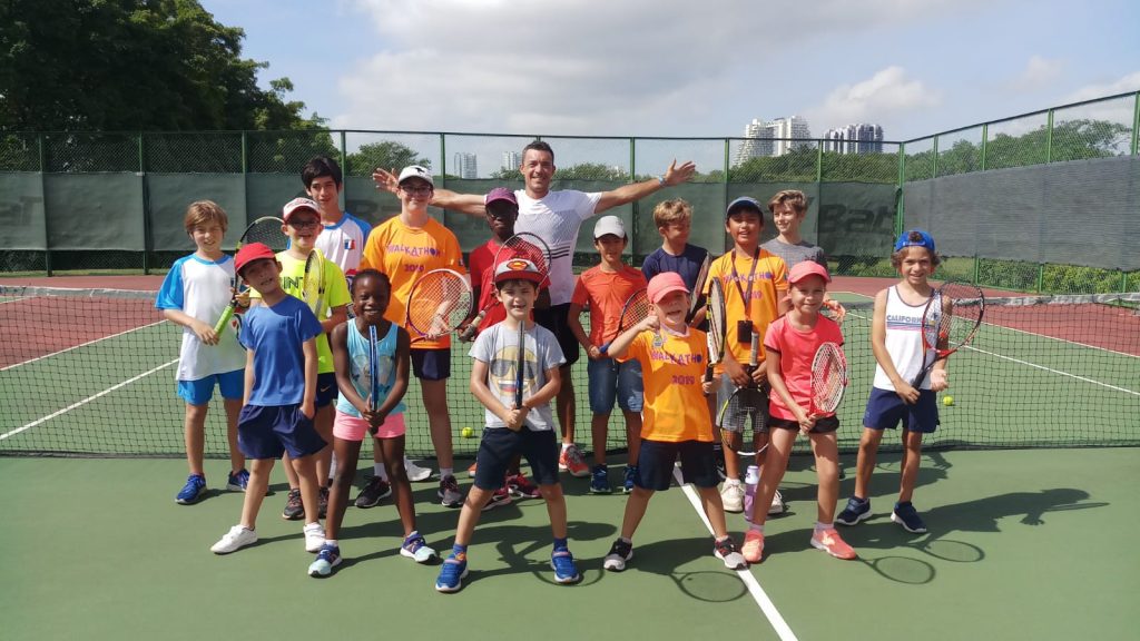 Junior tennis lessons in Singapore with Pure Sport