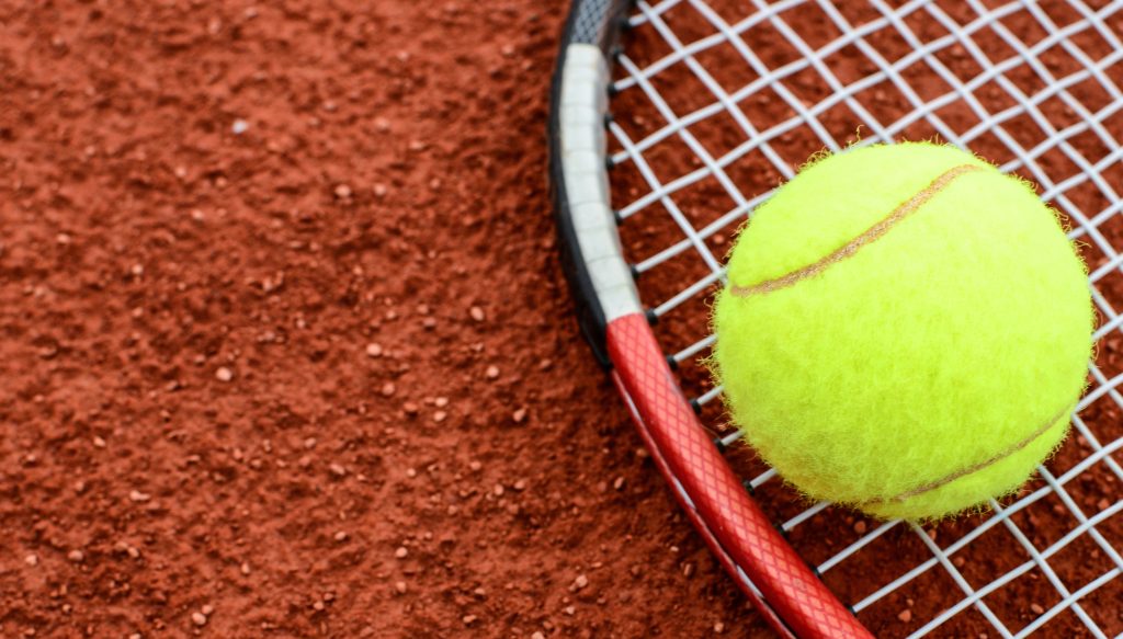 Tennis player in action — Pure Sport coaching Singapore