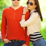 Happy couple tennis players reviewing Pure Sport Singapore coaching